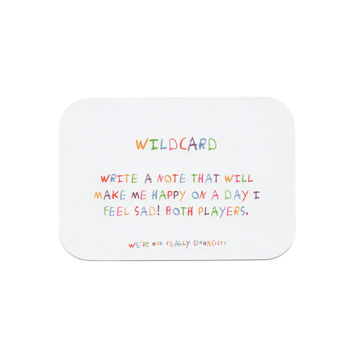 We're Not Really Strangers Kids Edition. Front facing view of game card reading "Wildcard - write a note that will make me happy on a day I feel sad! Both players."